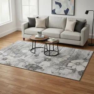Photo of Gray And Silver Floral Washable Area Rug With UV Protection