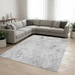 Photo of Gray And Silver Floral Washable Area Rug With UV Protection