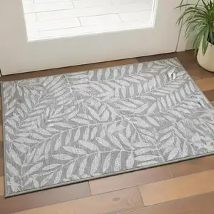 Photo of Gray And Silver Floral Washable Area Rug With UV Protection