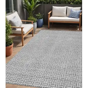 Photo of Gray And Silver Geometric Washable Indoor Outdoor Area Rug