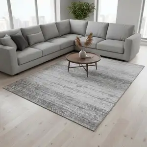 Photo of Gray And Silver Striped Washable Area Rug With UV Protection