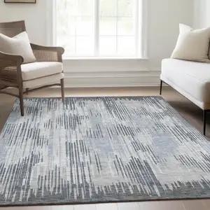 Photo of Gray And Silver Striped Washable Area Rug With UV Protection