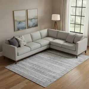 Photo of Gray And Silver Striped Washable Area Rug With UV Protection