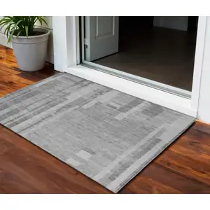 Photo of Gray And Silver Striped Washable Indoor Outdoor Area Rug