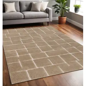 Photo of Gray And Taupe Geometric Area Rug