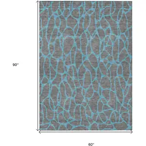 Photo of Gray And Teal Blue Geometric Washable Indoor Outdoor Area Rug