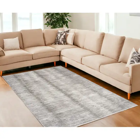 Gray And White Abstract Area Rug With Fringe Photo 1