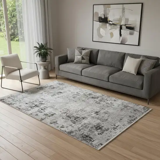 Gray And White Abstract Distressed Area Rug With Fringe Photo 1