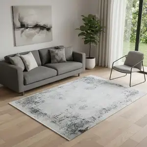 Photo of Gray And White Abstract Distressed Area Rug