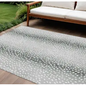 Photo of Gray And White Animal Print Washable Indoor Outdoor Area Rug