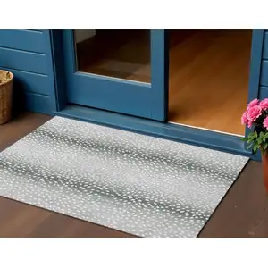 Photo of Gray And White Animal Print Washable Indoor Outdoor Area Rug