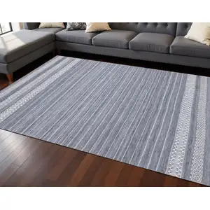 Photo of Gray And White Striped Hand Woven Area Rug