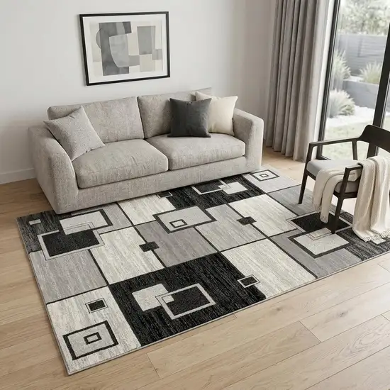 Gray And Black Geometric Distressed Area Rug Photo 1