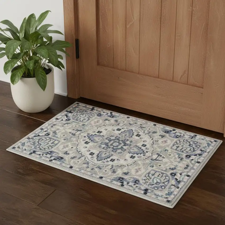 Gray Beige And Blue Floral Area Rug Photo 1