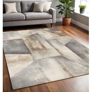 Photo of Gray Beige And Brown Abstract Area Rug