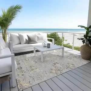 Photo of Gray Beige And Ivory Floral Washable Indoor Outdoor Area Rug