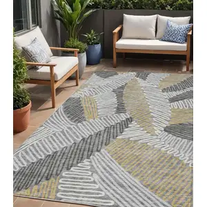 Photo of Gray Beige And Ivory Floral Washable Indoor Outdoor Area Rug