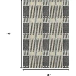 Photo of Gray Beige And Ivory Plaid Washable Area Rug With UV Protection