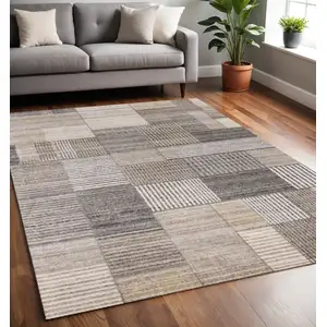 Photo of Gray Black And Beige Geometric Area Rug