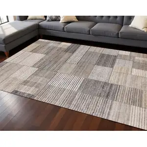 Photo of Gray Black And Beige Geometric Area Rug