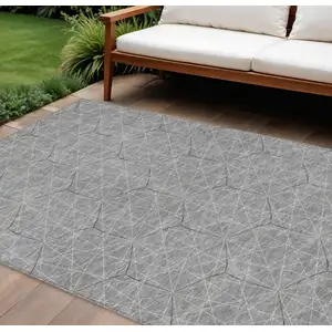 Photo of Gray Black And Ivory Geometric Washable Indoor Outdoor Area Rug