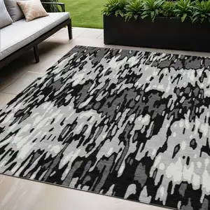 Photo of Gray Black And Ivory Striped Washable Indoor Outdoor Area Rug