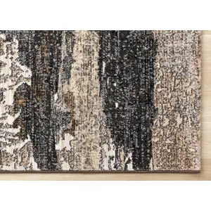 Photo of Gray Black And Tan Abstract Area Rug