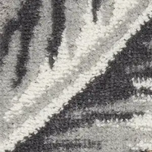 Photo of Gray Black And Tan Tropical Floral Area Rug