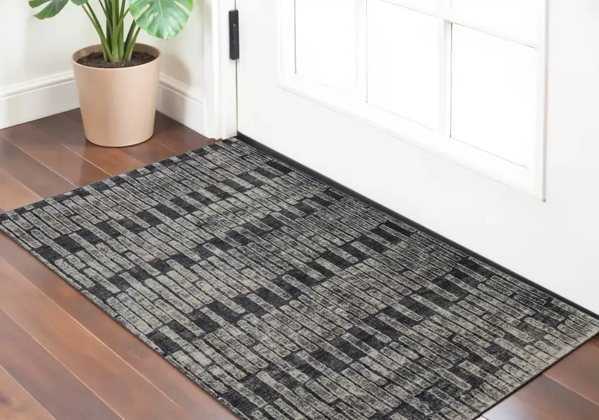 Gray Black and Ivory Geometric Power Loom Worn Faded Area Rug Photo 1