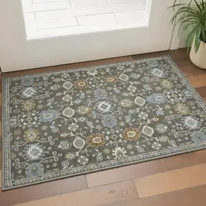 Photo of Gray Blue And Brown Floral Area Rug With Fringe