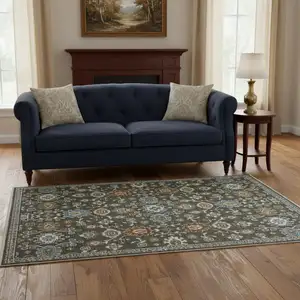 Photo of Gray Blue And Brown Floral Area Rug With Fringe