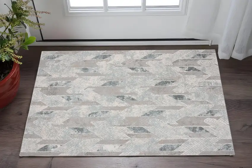 Gray Blue And Cream Geometric Distressed Stain Resistant Area Rug Photo 1