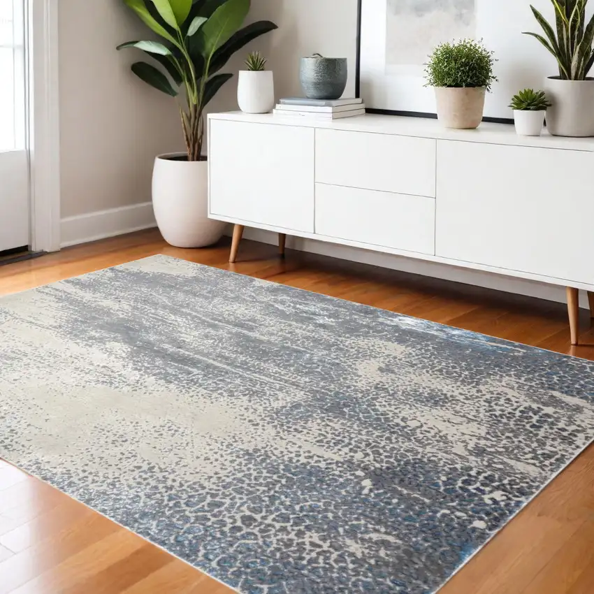 Ivory Gray And Blue Abstract Area Rug Photo 1