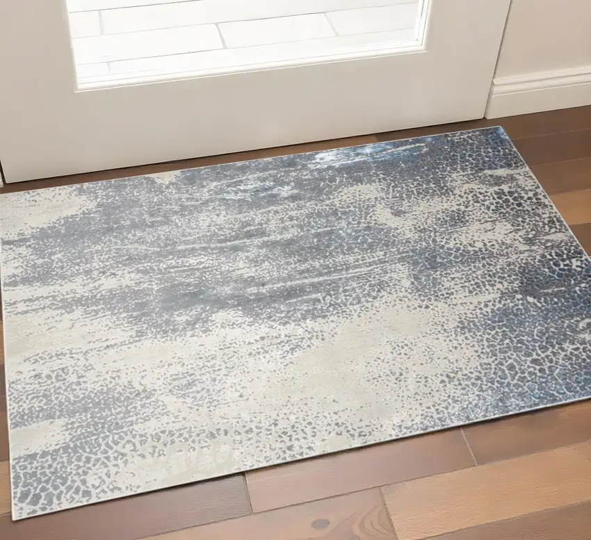 Ivory Gray And Blue Abstract Area Rug Photo 1