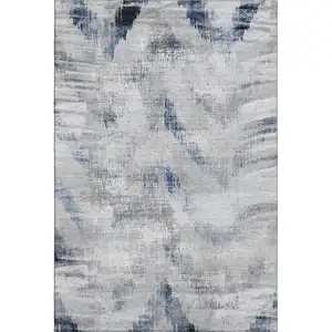 Photo of Gray Blue And Ivory Abstract Washable Area Rug With UV Protection