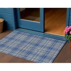 Photo of Gray Blue And Ivory Plaid Washable Indoor Outdoor Area Rug
