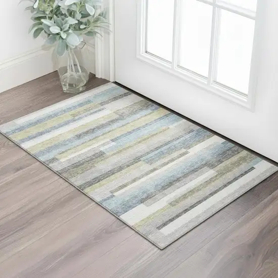Gray Blue And Ivory Striped Washable Area Rug With UV Protection Photo 1