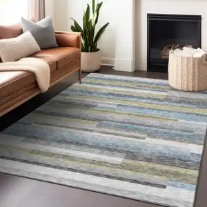 Photo of Gray Blue And Ivory Striped Washable Area Rug With UV Protection