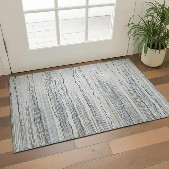 Gray Blue And Ivory Striped Washable Area Rug With UV Protection Photo 1