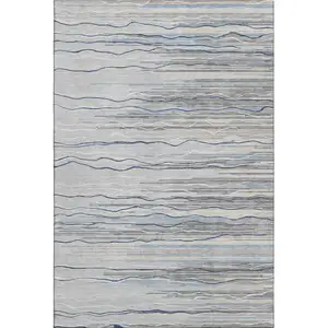 Photo of Gray Blue And Ivory Striped Washable Area Rug With UV Protection