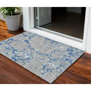 Photo of Gray Blue And Ivory Striped Washable Indoor Outdoor Area Rug