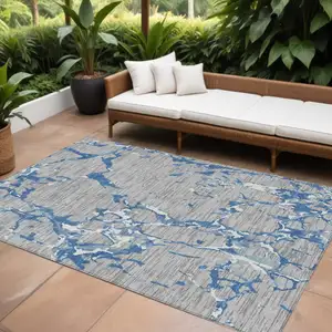 Photo of Gray Blue And Ivory Striped Washable Indoor Outdoor Area Rug