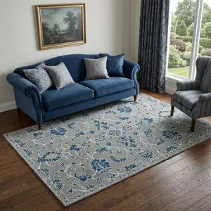 Photo of Gray Blue And Ivory Wool Floral Hand Hooked Area Rug