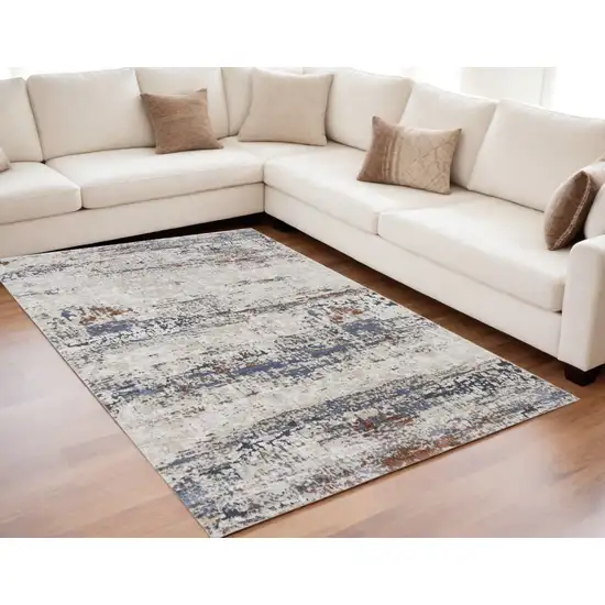 Gray Blue and Ivory Abstract Power Loom Area Rug Photo 1