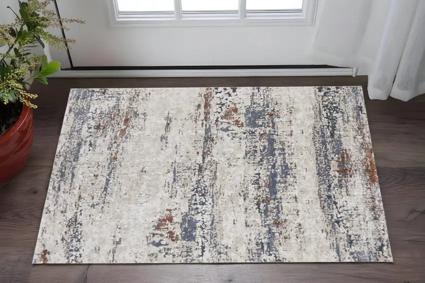 Gray Blue and Ivory Abstract Power Loom Area Rug Photo 1