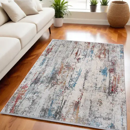 Gray Blue and Red Abstract Power Loom Area Rug With Fringe Photo 1