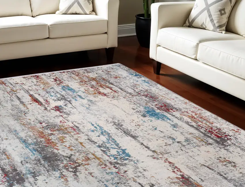 Gray Blue and Red Abstract Power Loom Area Rug With Fringe Photo 1