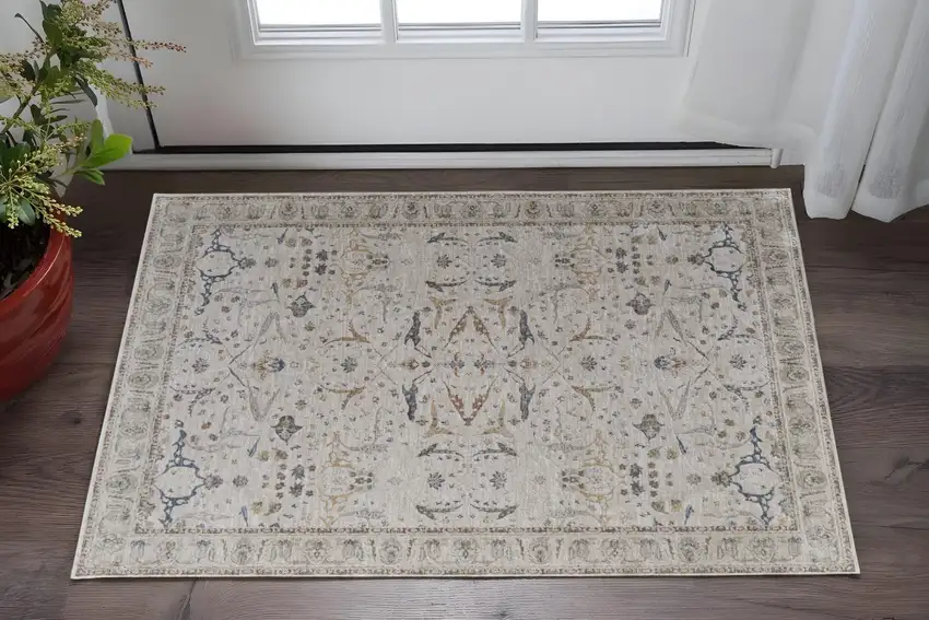 Gray Blue and Red Ikat Power Loom Worn Faded Area Rug With Fringe Photo 1