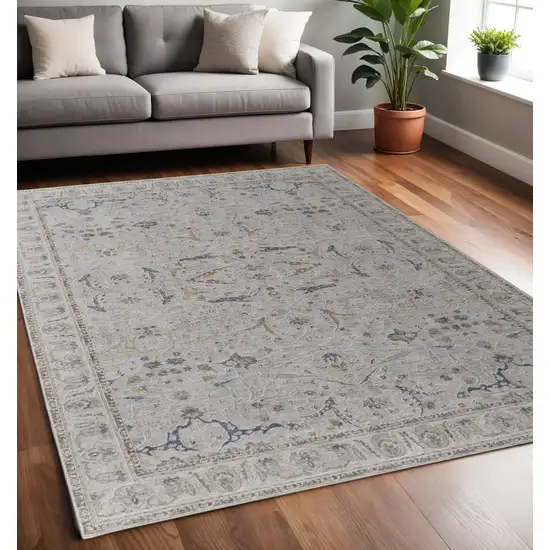 Ivory Blue And Taupe Ikat Distressed Area Rug With Fringe Photo 1