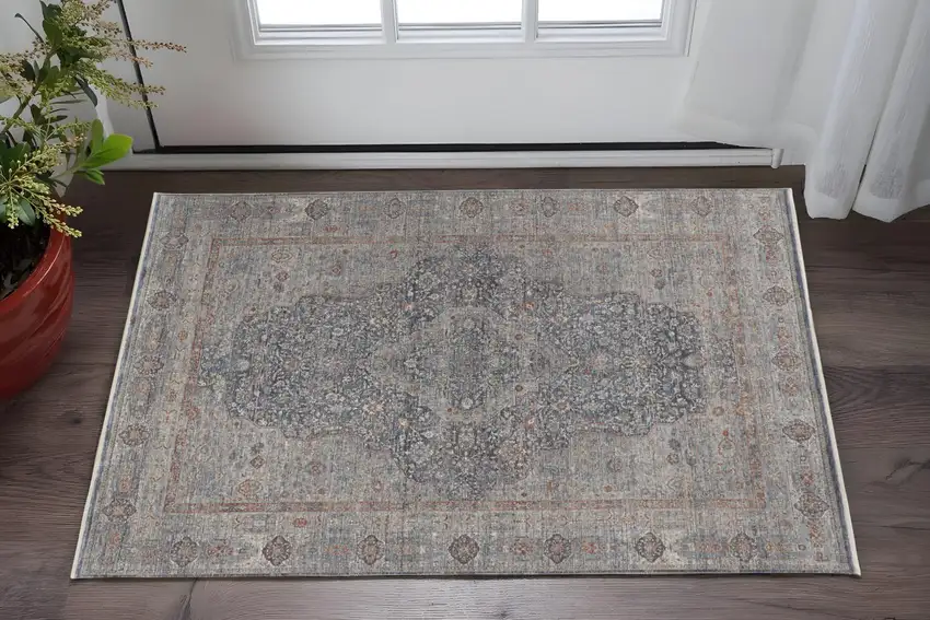 Gray Blue and Red Oriental Power Loom Worn Faded Area Rug With Fringe Photo 1